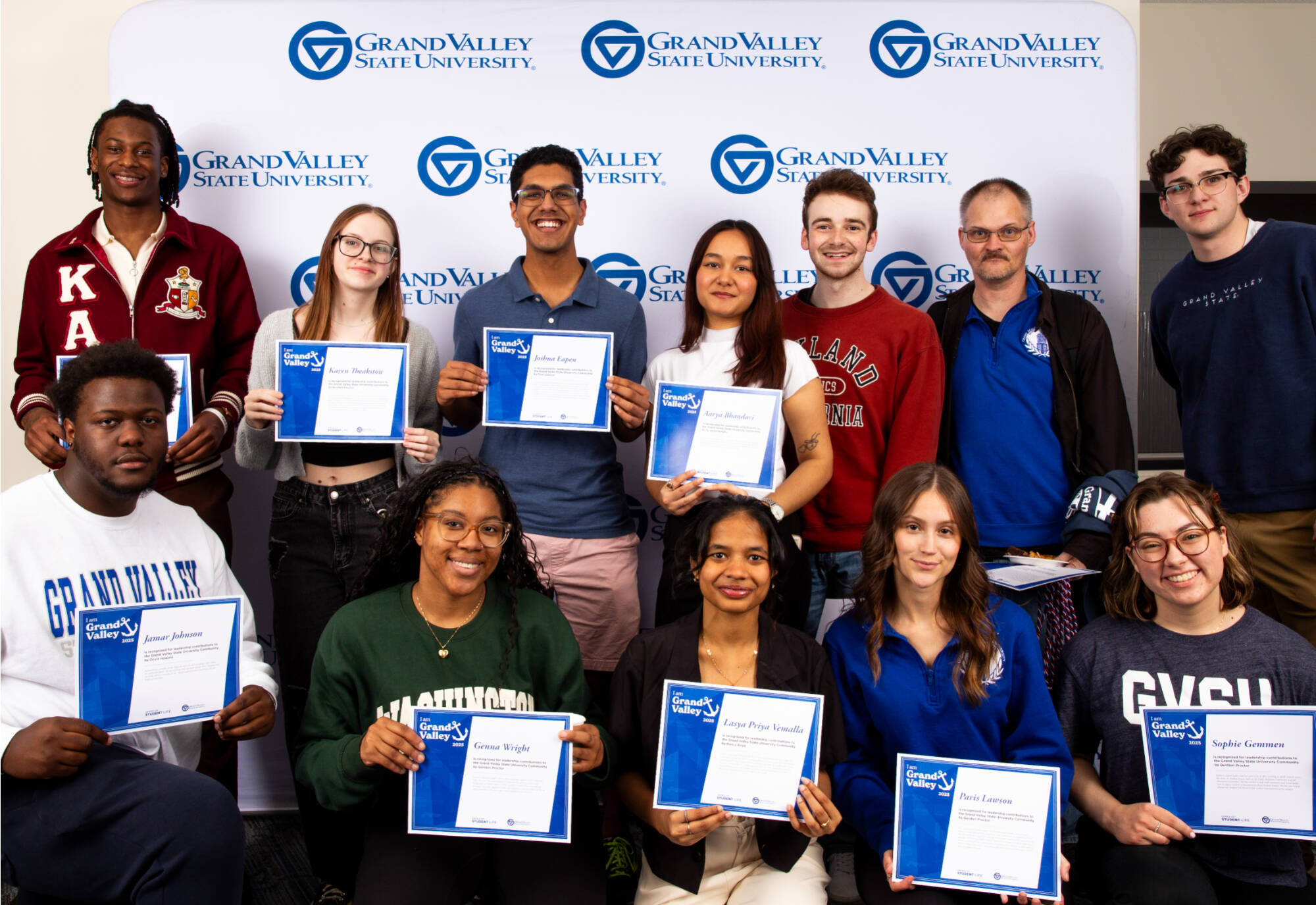 Student leaders posing with their certificates